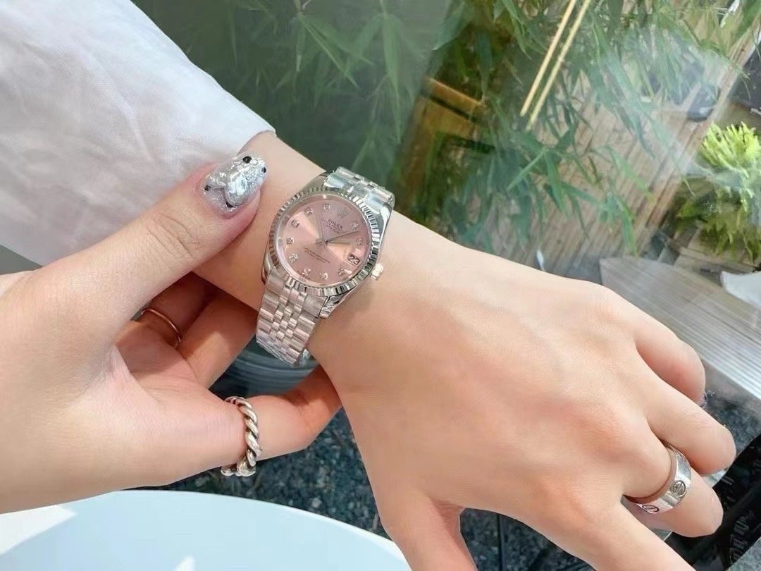 Rolex Pink Dial Silver Bracelet Watch — model
