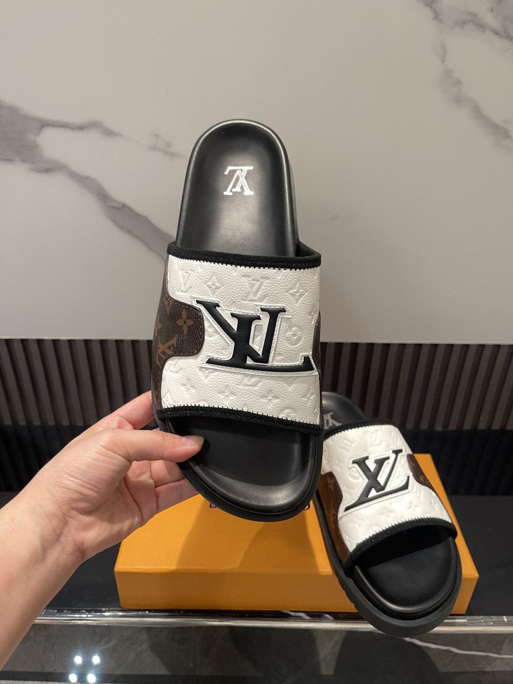 Louis Vuitton Brown Patterned Slide Sandals — model