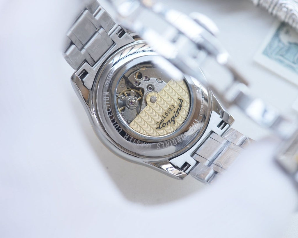 Longines Silver Gold White Dial Watch — detail