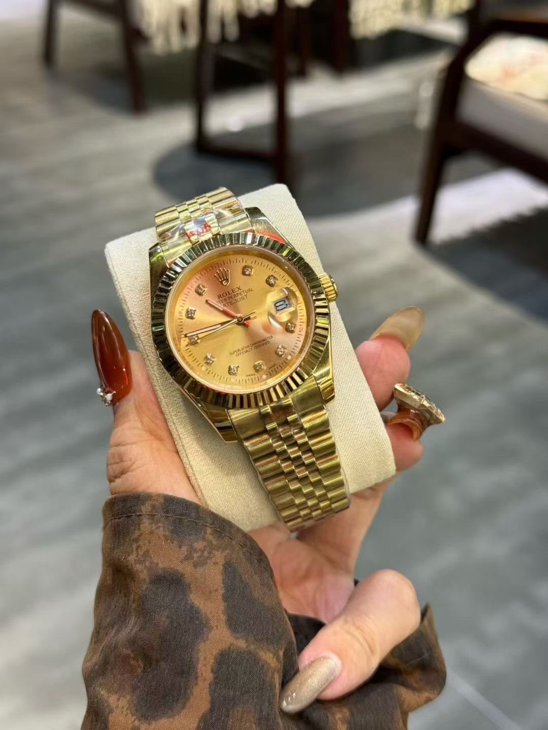 Rolex Gold-Tone Champagne Dial Watch — hero