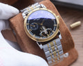 Patek Philippe Silver Gold Black Dial Bracelet Watch — hero