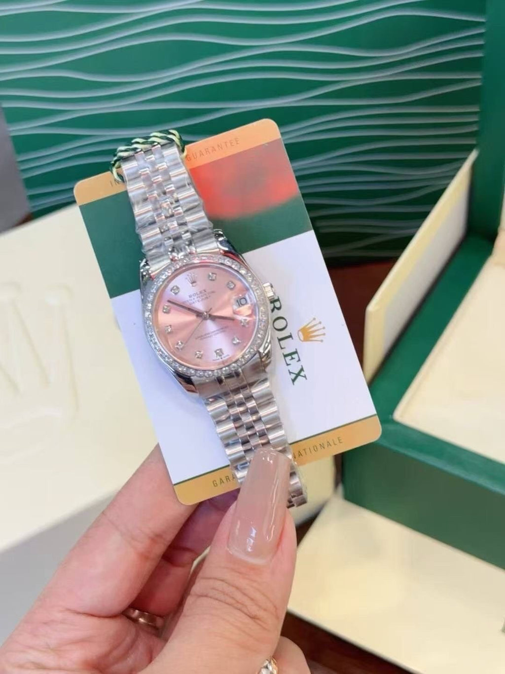 Rolex Pink Dial Metal Bracelet Watch — front