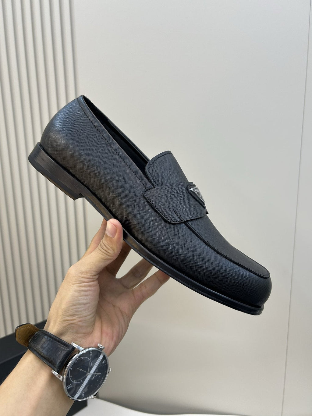 Prada Black Triangular Plaque Loafers — model
