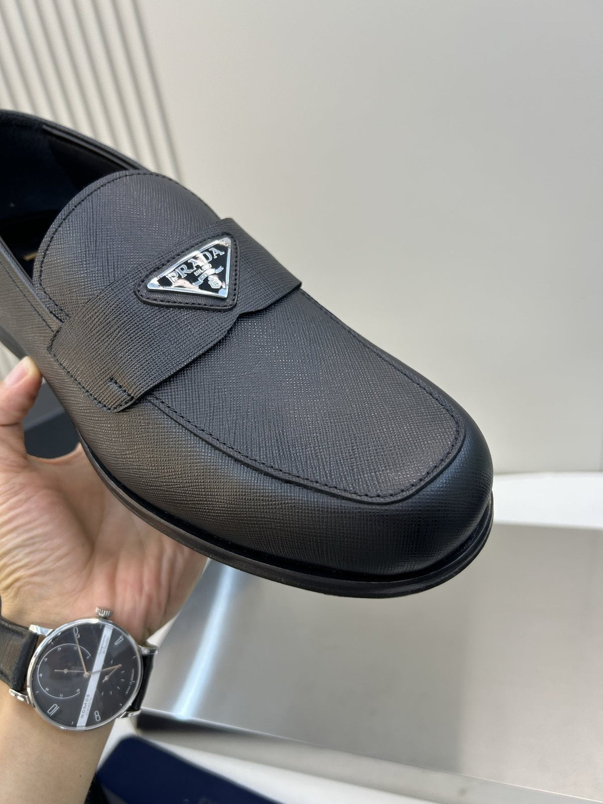 Prada Black Triangular Plaque Loafers — detail