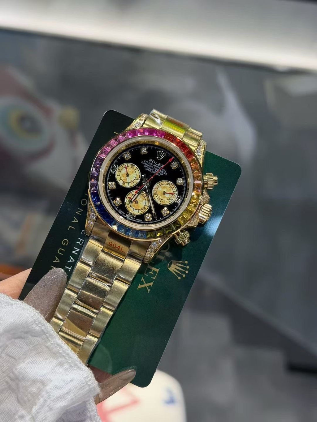 Rolex Rainbow Gemstone Chronograph Watch — front