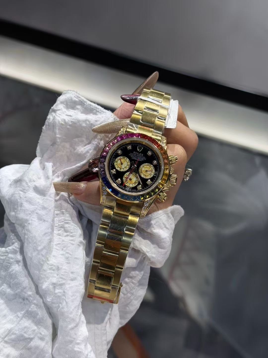 Rolex Rainbow Gemstone Chronograph Watch — front