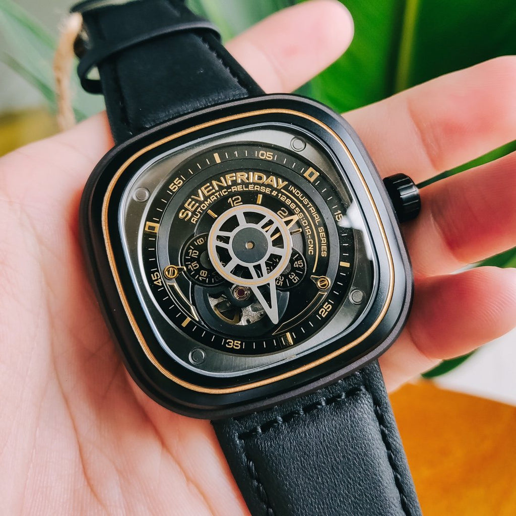 SEVENFRIDAY Black Gold Disc Dial Watch — front