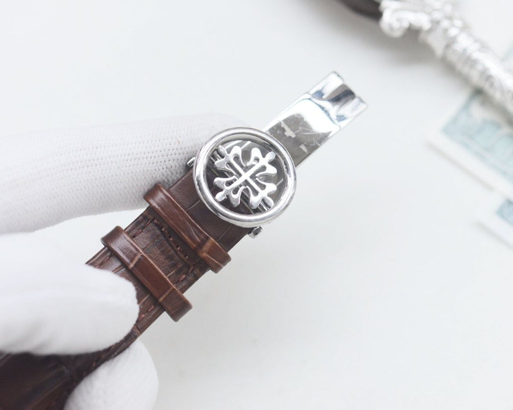 Patek Philippe Brown Silver Dial Strap Watch — detail