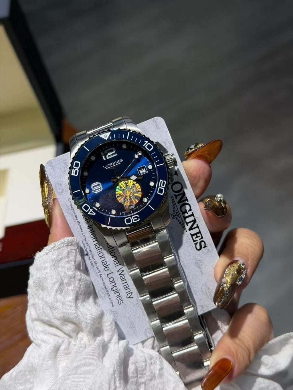 Longines Blue Bezel Link Bracelet Watch — front