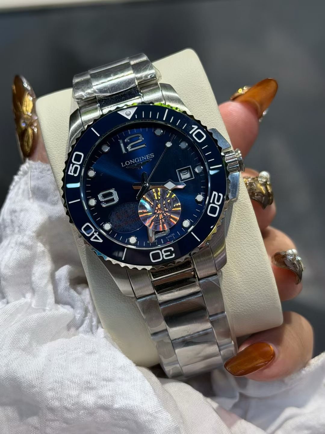 Longines Blue Bezel Link Bracelet Watch — front