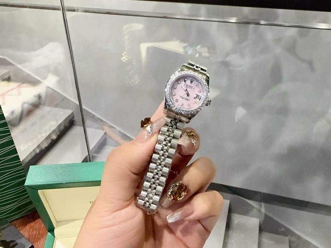 Rolex Pink Dial Watch — front