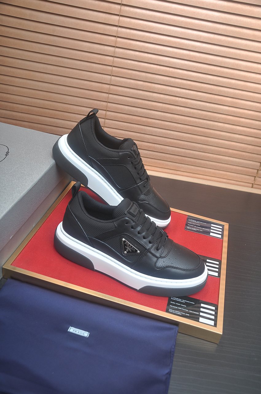Prada Triangle Plaque Low-Top Sneakers — front