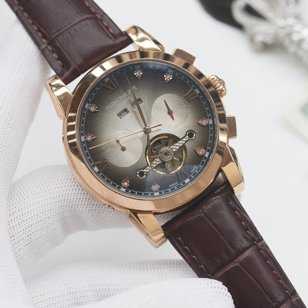 PATEK PHILIPPE Gold Brown Leather Strap Watch — front