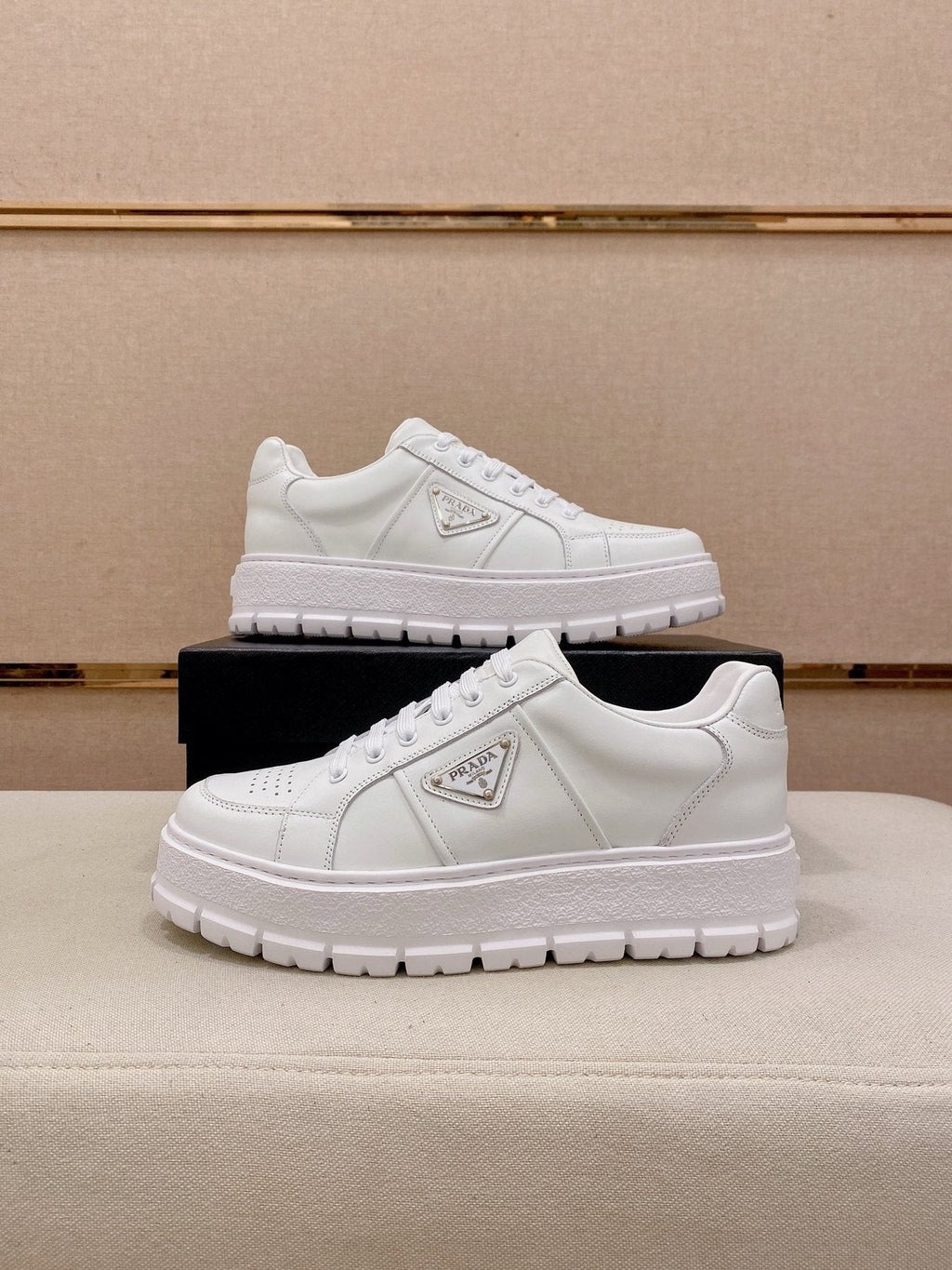 Prada Triangle Plaque Low-Top Sneakers — side