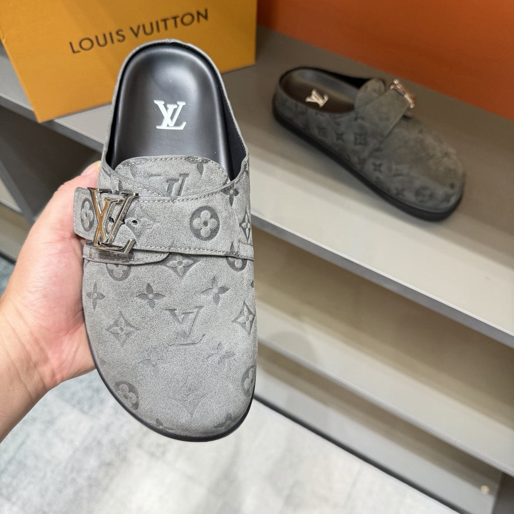 Louis Vuitton Embossed Buckle Slide Sandals — model