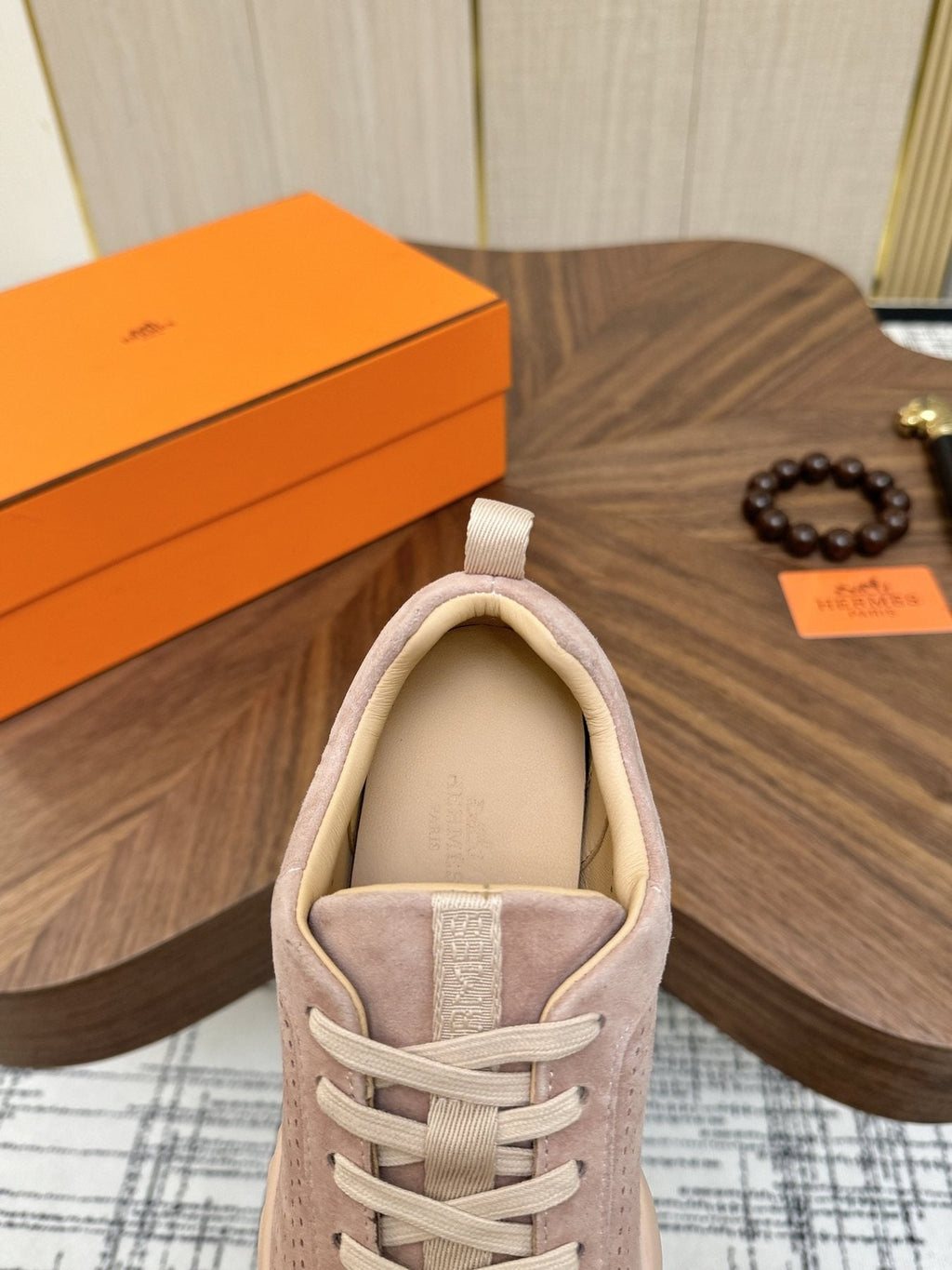 Hermès Perforated Low-Top Sneakers — side