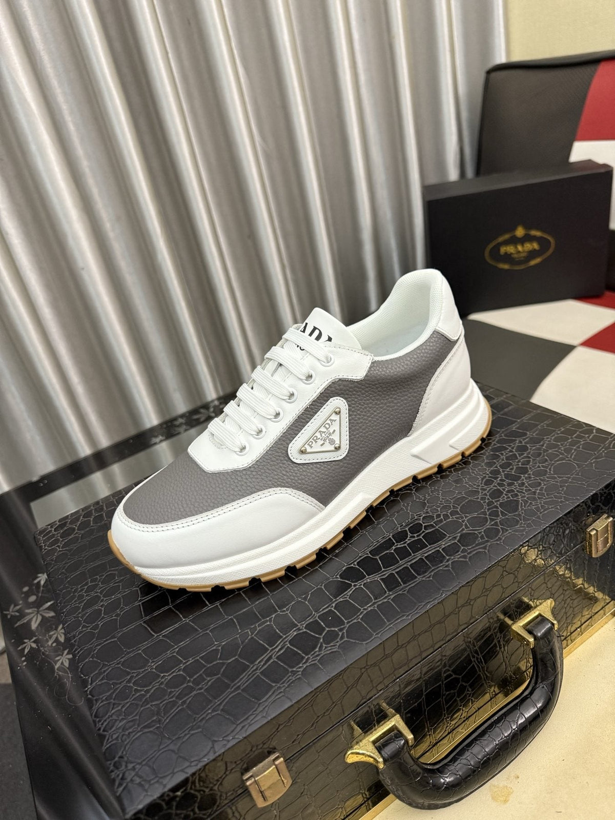 Prada Triangle Badge Low-Top Sneakers — front