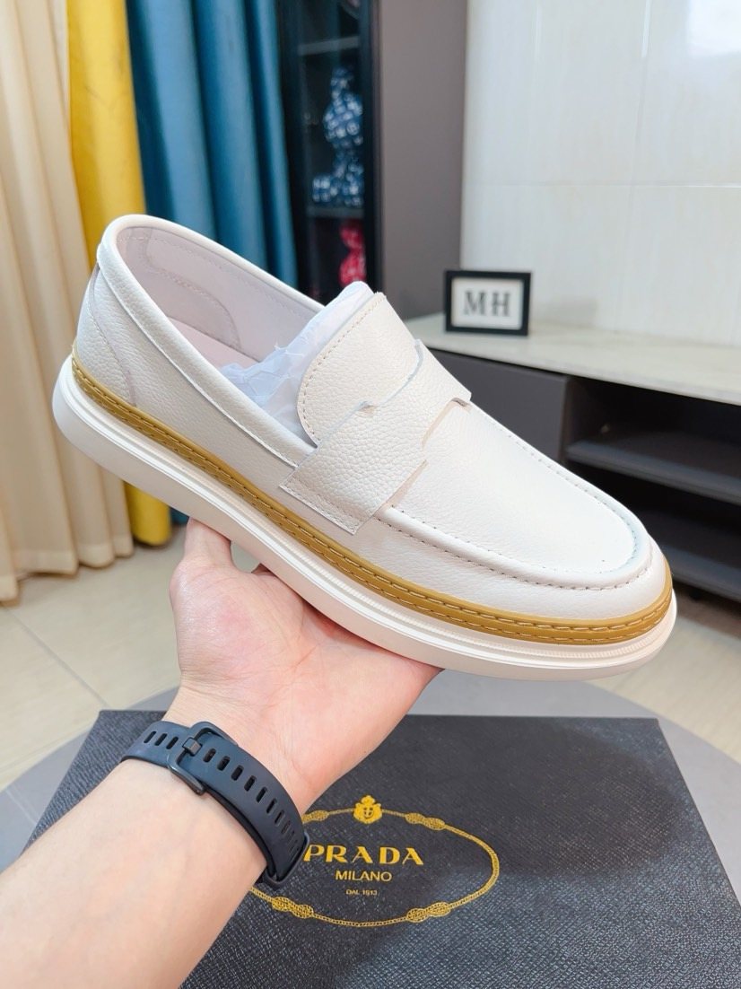 Prada Textured Slip-On Shoes — side