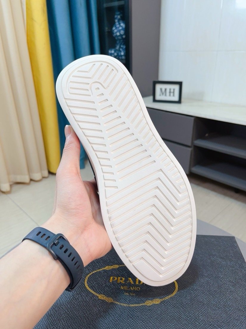 Prada Textured Slip-On Shoes — side